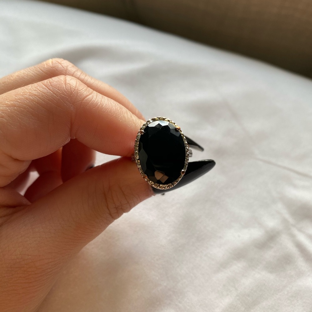 Black stone with high setting ring